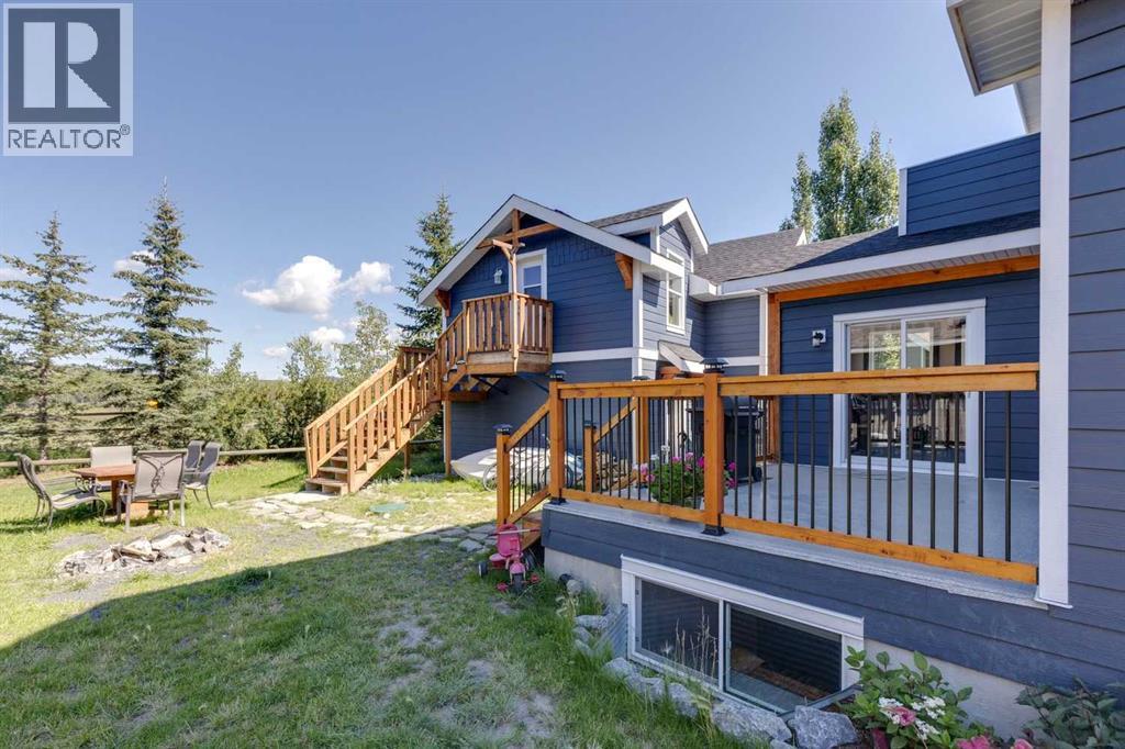 216 Cottageclub Crescent, Rural Rocky View County, Alberta  T4C 1B1 - Photo 28 - A2248971
