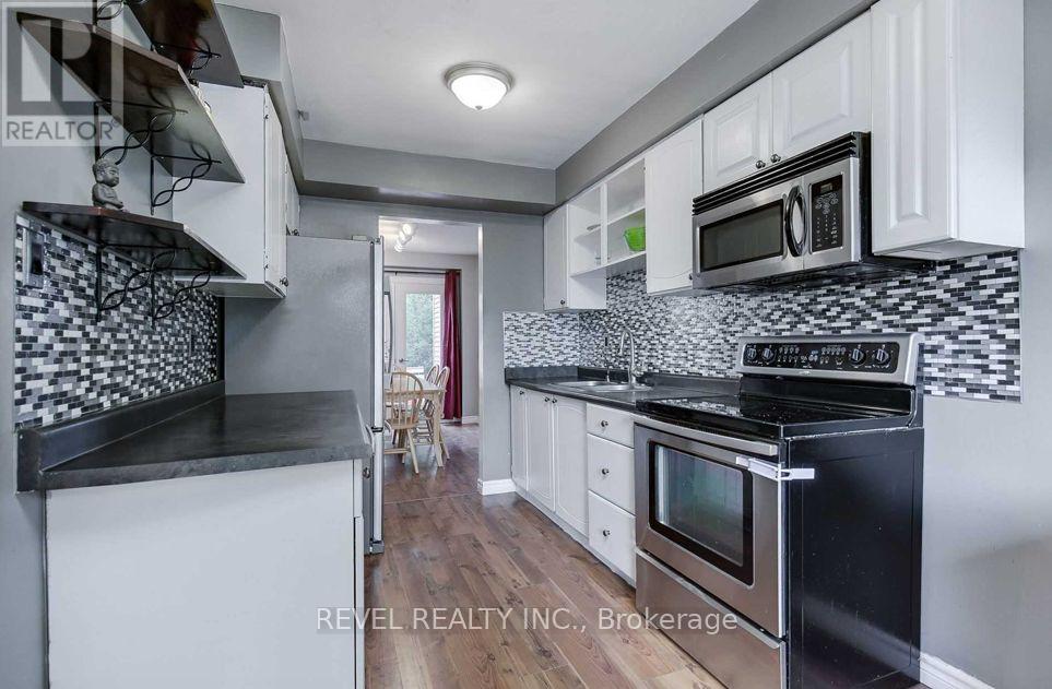 24 Lampman Lane, Barrie, Ontario  L4N 5B1 - Photo 7 - S12347307
