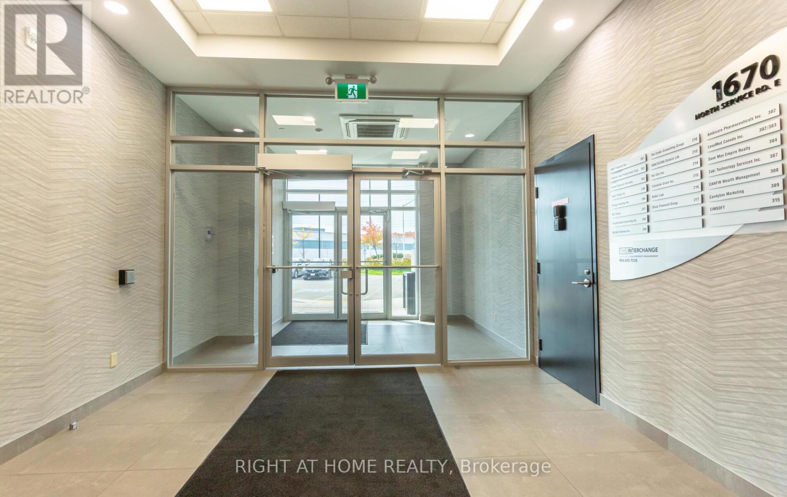 212 - 1670 North Service Road E, Oakville (Qe Queen Elizabeth), Ontario  L6H 7G3 - Photo 9 - W12347407
