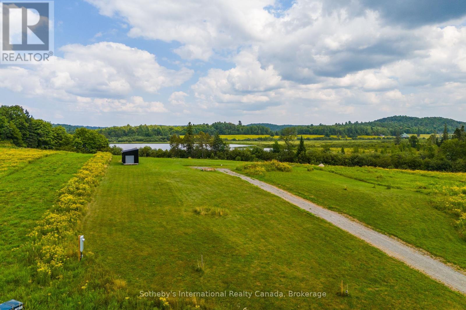 71 Spider Lake Lane, Huntsville, Ontario  P0B 1M0 - Photo 3 - X12347834