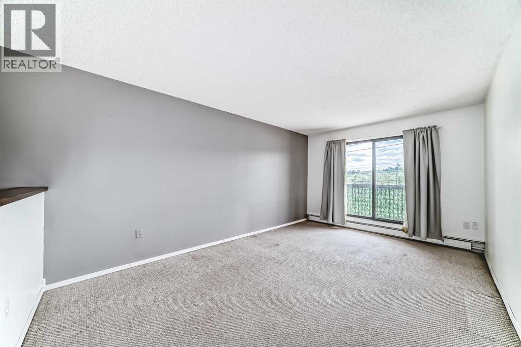 Property at 206, 2611 1 Avenue NW image 3