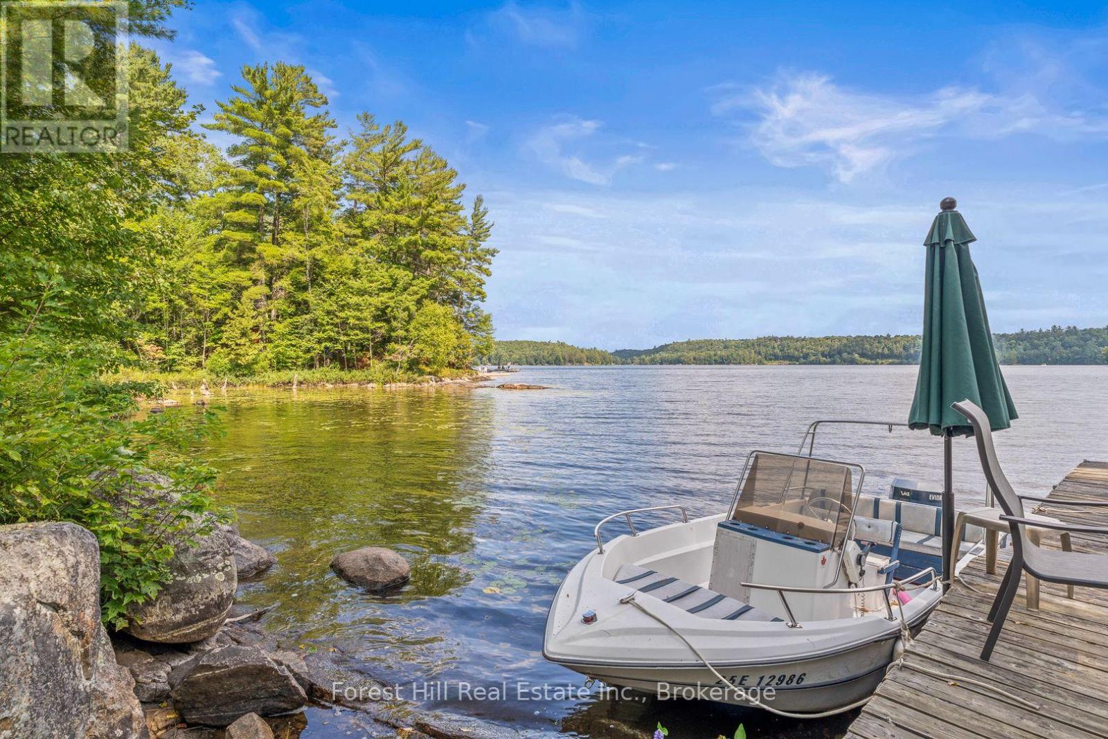 1277 Causeway Drive, Algonquin Highlands, Ontario  P0A 1E0 - Photo 8 - X12348195