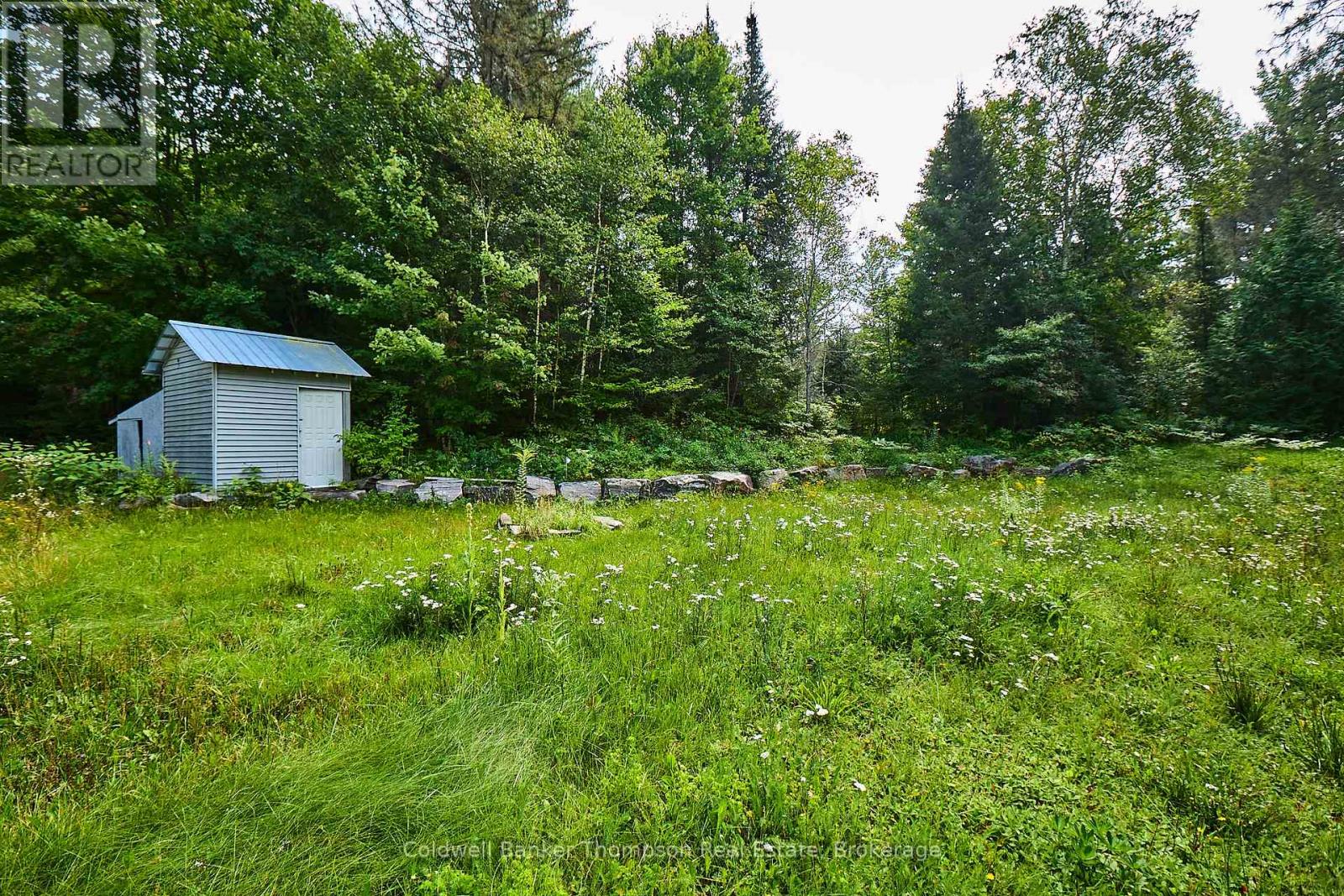 185 Halls Road E, Magnetawan, Ontario  P0A 1Z0 - Photo 10 - X12348566