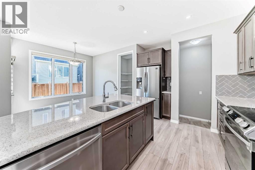 13 Carrington Manor Nw, Calgary, Alberta  T3P 0Z2 - Photo 8 - A2244806