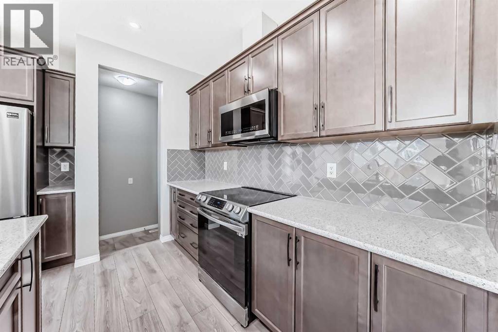 13 Carrington Manor Nw, Calgary, Alberta  T3P 0Z2 - Photo 7 - A2244806