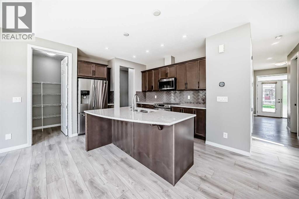 13 Carrington Manor Nw, Calgary, Alberta  T3P 0Z2 - Photo 5 - A2244806