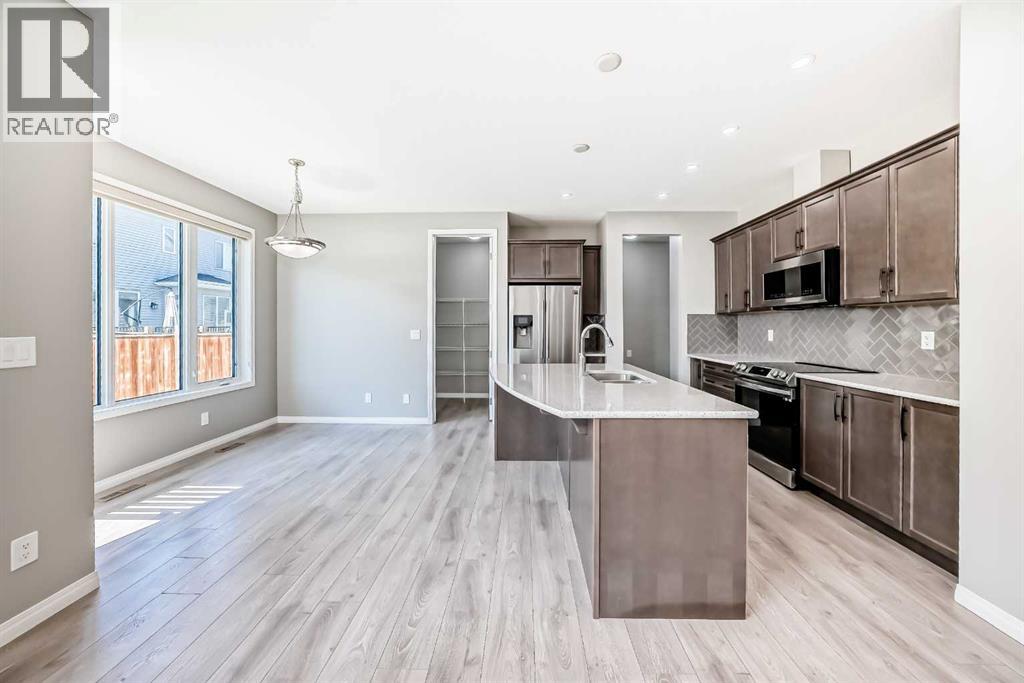 13 Carrington Manor Nw, Calgary, Alberta  T3P 0Z2 - Photo 6 - A2244806