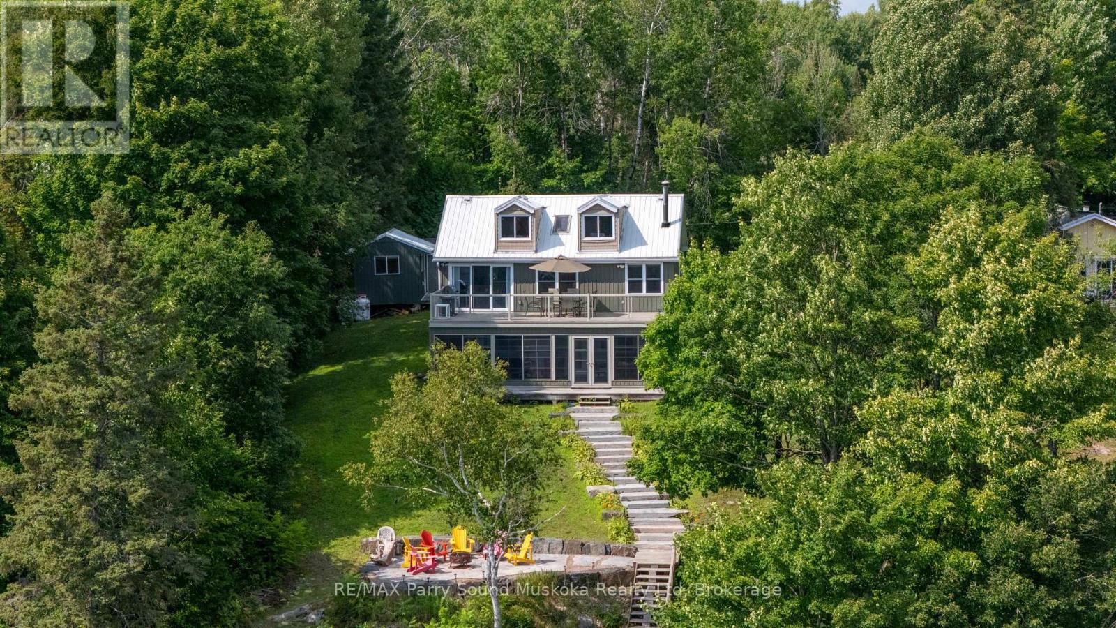 16 Golden Horseshoe Lane, Whitestone, Ontario  P0G 1G0 - Photo 2 - X12348921