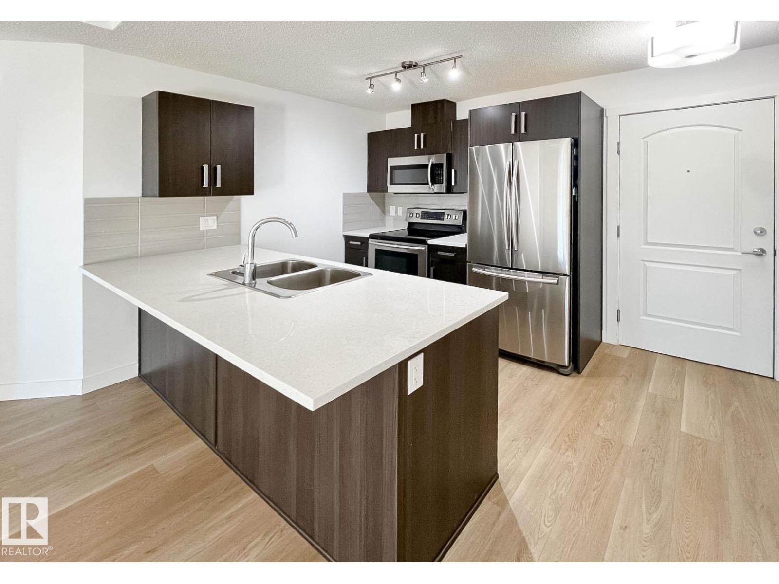 Property at #406 667 WATT BV SW image 2