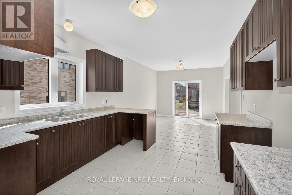 49 Huntsworth Avenue, Thorold, Ontario  L2V 0N2 - Photo 6 - X12349372