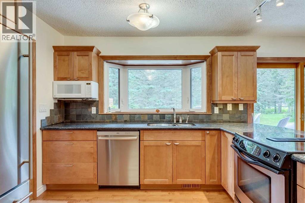 28 Wolf Drive, Rural Rocky View County, Alberta  T3Z 1A3 - Photo 13 - A2246657