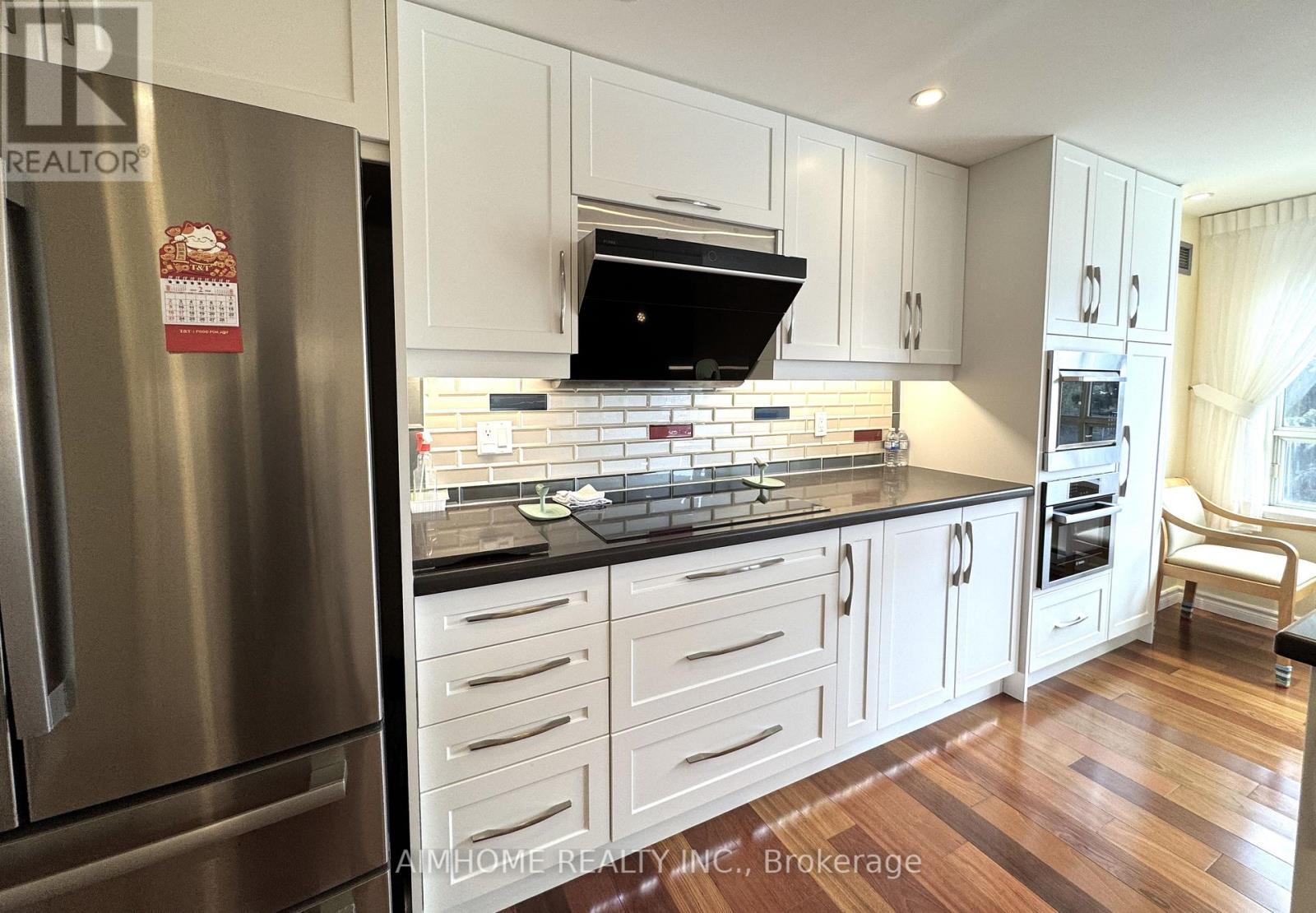 404 - 175 Bamburgh Circle, Toronto, Ontario  M1W 3X8 - Photo 8 - E12349535
