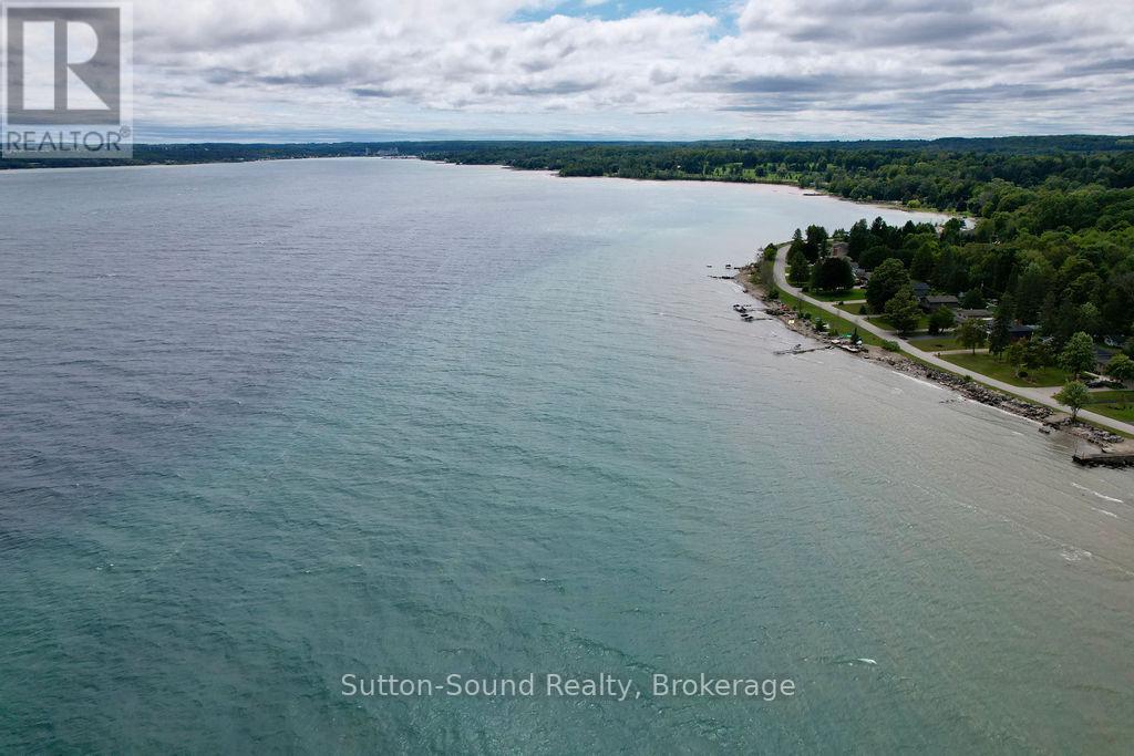 166 Old Beach Drive, Georgian Bluffs, Ontario  N4K 5N4 - Photo 36 - X12347726