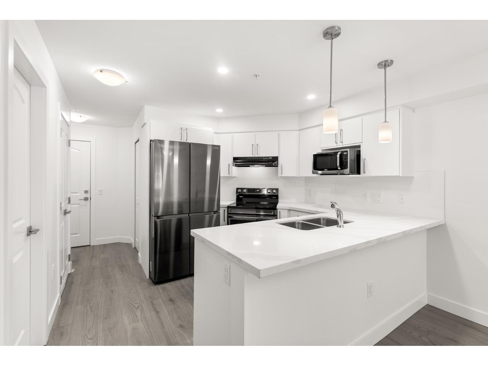 110 19730 56 Avenue, Langley, British Columbia V3A 3X6 - Photo 5 - R3031006