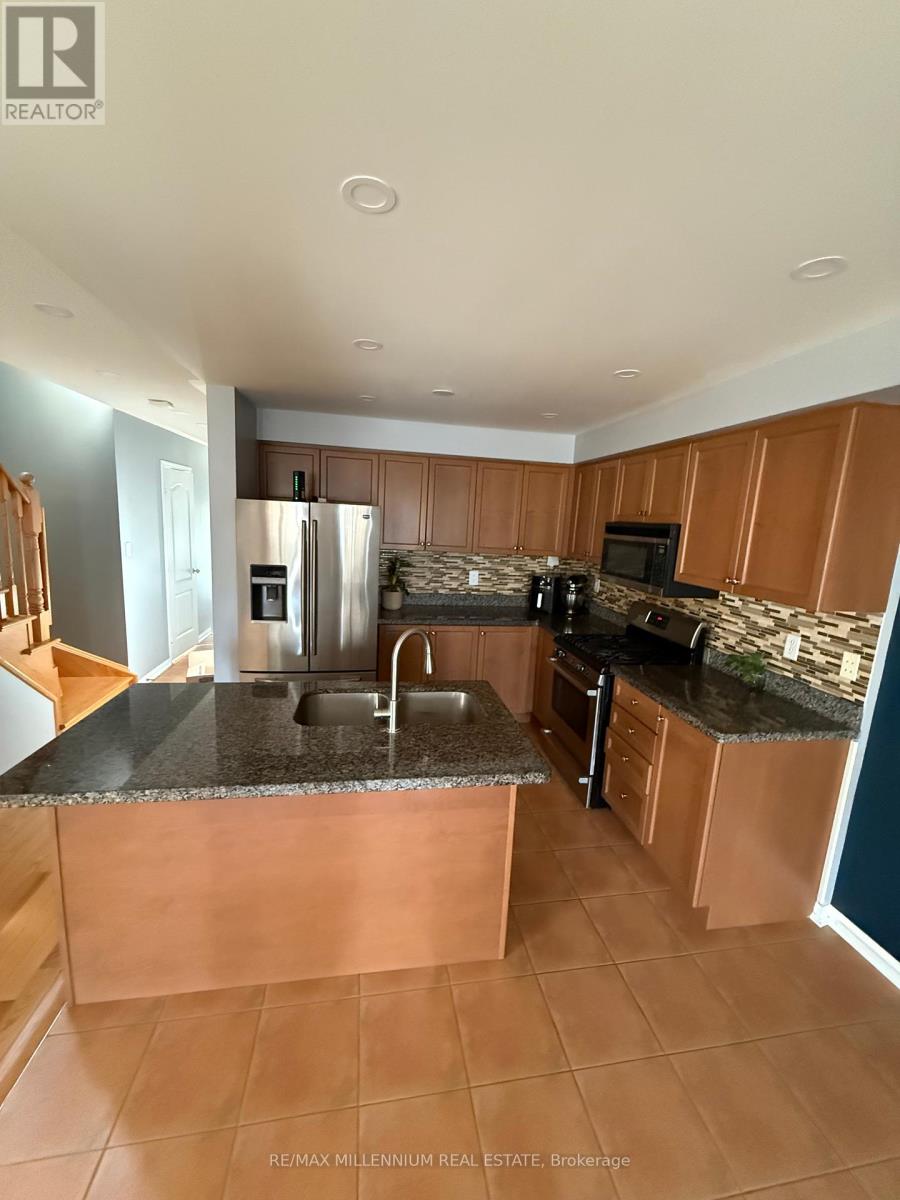 1128 Houston Drive, Milton, Ontario  L9T 6E8 - Photo 5 - W12351009
