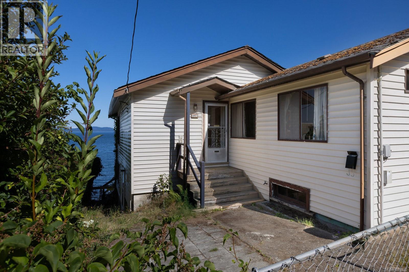 Property at 5015 Cordova Bay Rd image 2