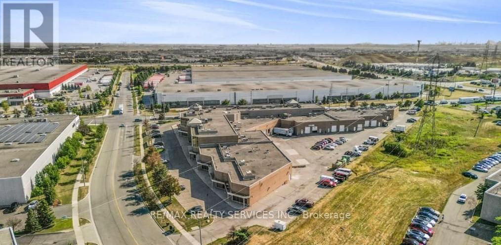 207 - 6660 Kennedy Road, Mississauga, Ontario L5T 2M9 - Photo 2 - W12351396