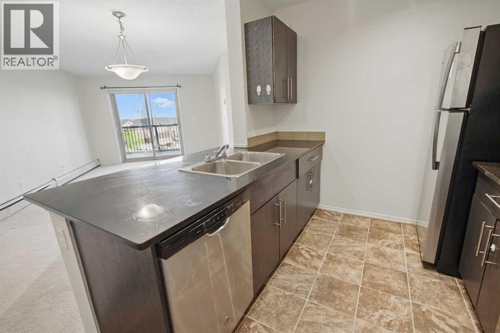 409, 15 Saddlestone Way Ne, Calgary, Alberta  T3J 0S3 - Photo 19 - A2226240