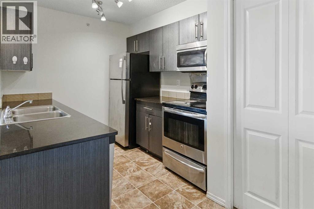 409, 15 Saddlestone Way Ne, Calgary, Alberta  T3J 0S3 - Photo 6 - A2226240