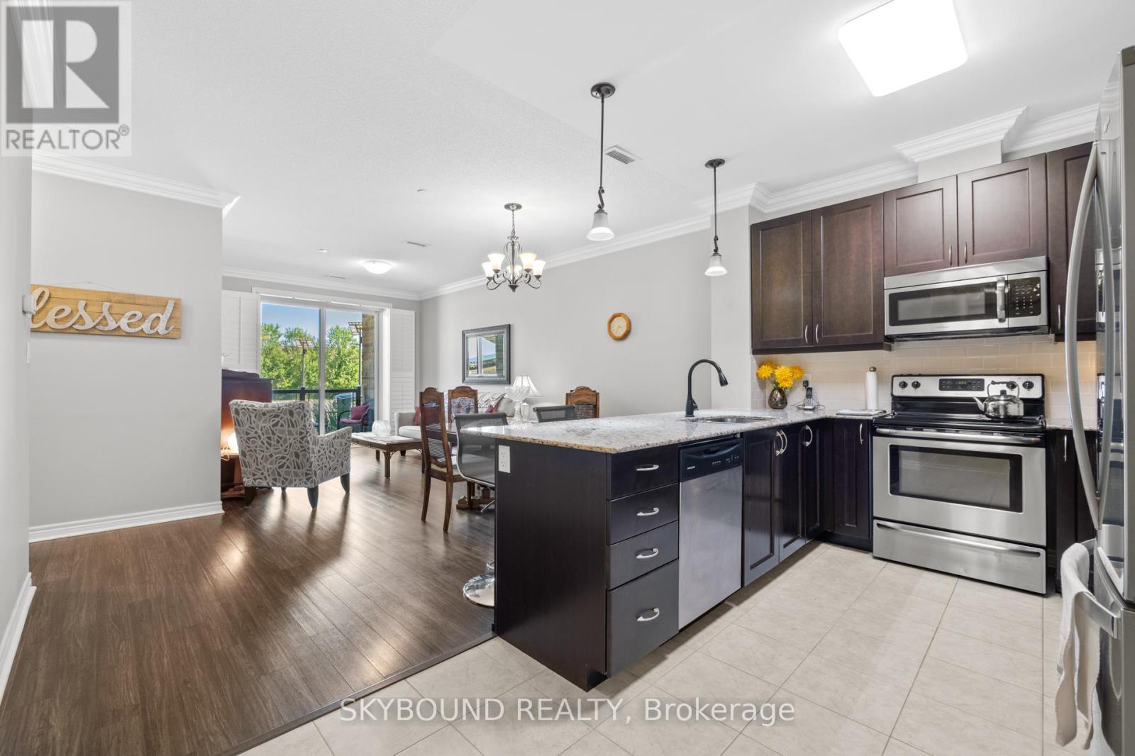 112 - 33 Whitmer Street, Milton, Ontario  L9T 8P9 - Photo 4 - W12295942