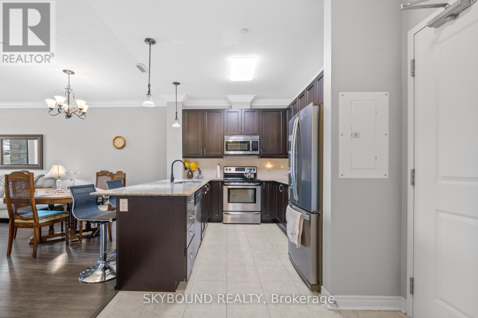 112 - 33 Whitmer Street, Milton, Ontario  L9T 8P9 - Photo 5 - W12295942