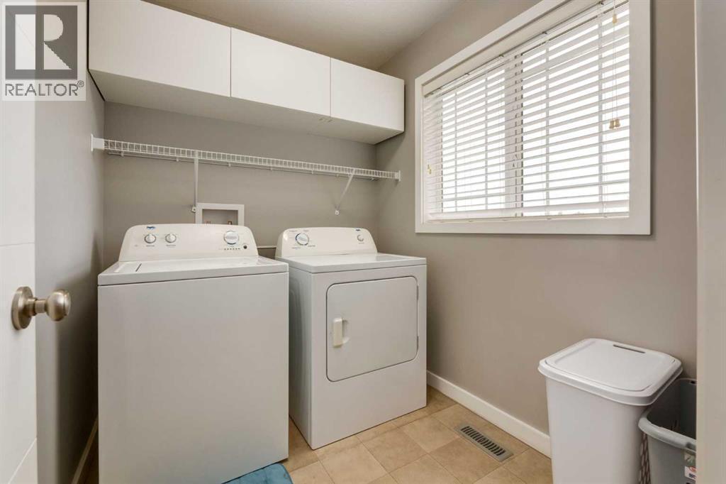 165 Bayside Loop Sw, Airdrie, Alberta  T4B 3W7 - Photo 30 - A2245730