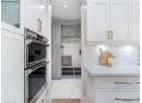 Mudroom featuring marble finish flooring