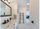 Bathroom featuring double vanity