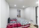 Bedroom featuring recessed lighting and wood finished floors