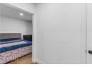 Bedroom featuring light wood-type flooring and recessed lighting