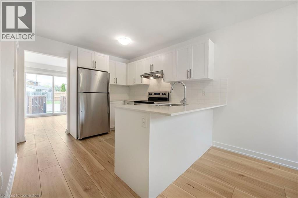 81 Woodman Drive N, Hamilton, Ontario L8H 2M5 - Photo 3 - 40756410