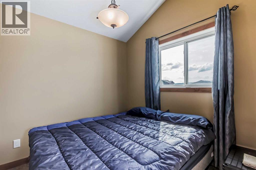 503 Cottageclub Bay, Rural Rocky View County, Alberta  T4C 1B1 - Photo 21 - A2238008