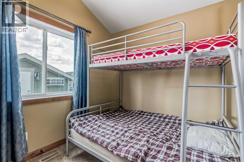 503 Cottageclub Bay, Rural Rocky View County, Alberta  T4C 1B1 - Photo 25 - A2238008