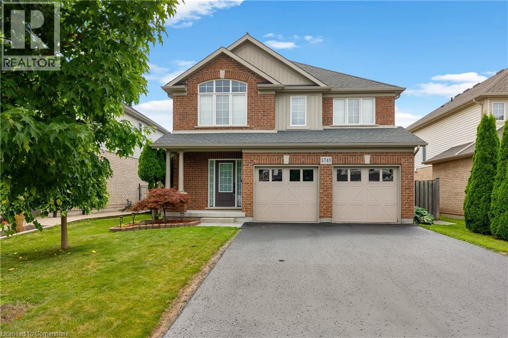 Property at 5743 JAKE Crescent image 2