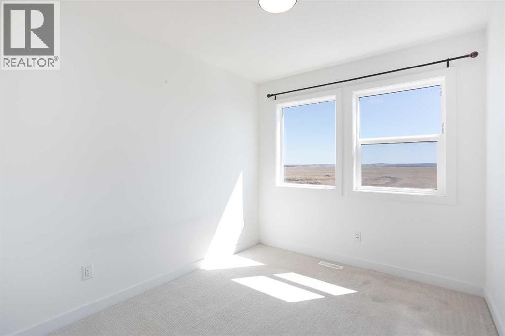 7561 202 Avenue Se, Calgary, Alberta  T3S 0E9 - Photo 17 - A2217122