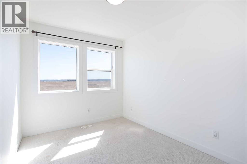 7561 202 Avenue Se, Calgary, Alberta  T3S 0E9 - Photo 19 - A2217122
