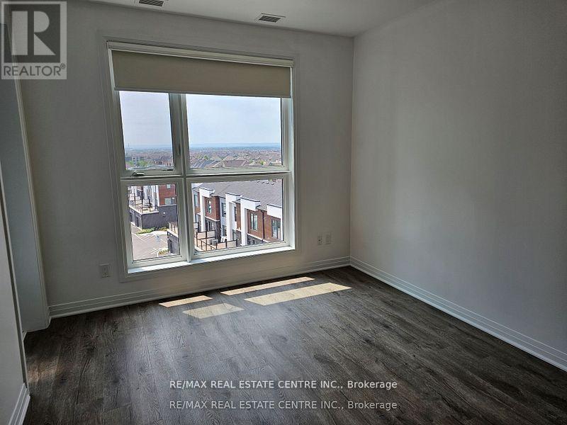 502 - 50 Kaitting Trail, Oakville, Ontario  L6M 5N3 - Photo 6 - W12354725