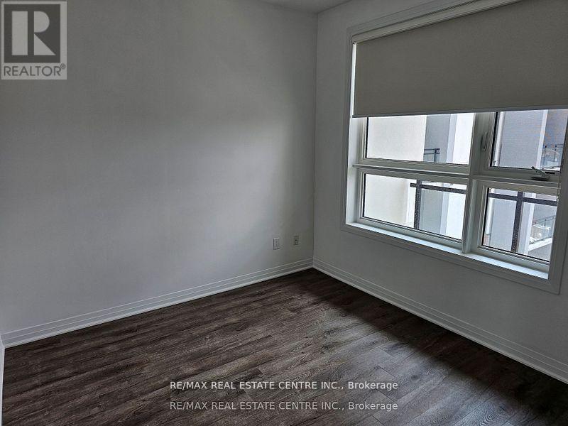 502 - 50 Kaitting Trail, Oakville, Ontario  L6M 5N3 - Photo 7 - W12354725