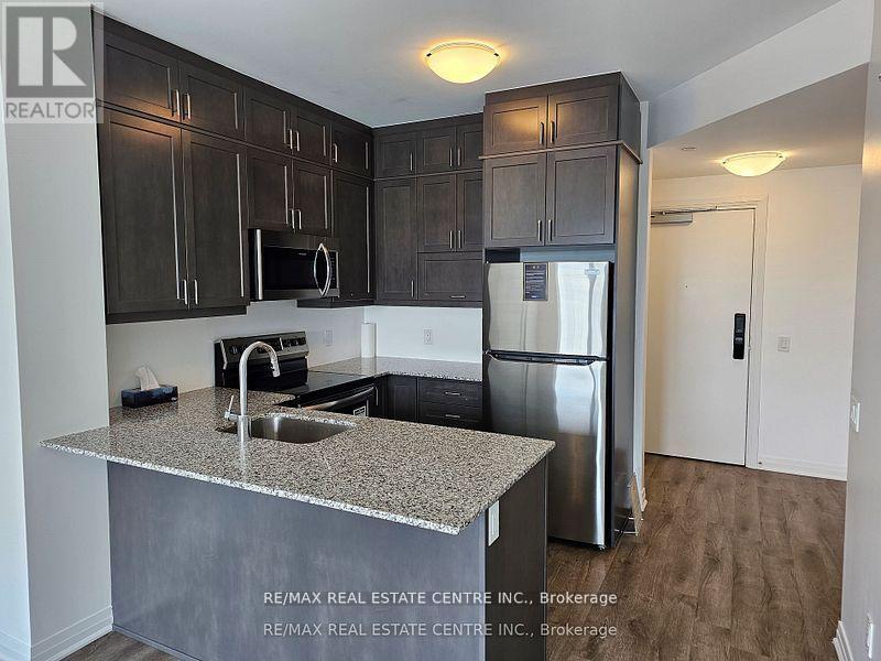 502 - 50 Kaitting Trail, Oakville, Ontario  L6M 5N3 - Photo 4 - W12354725