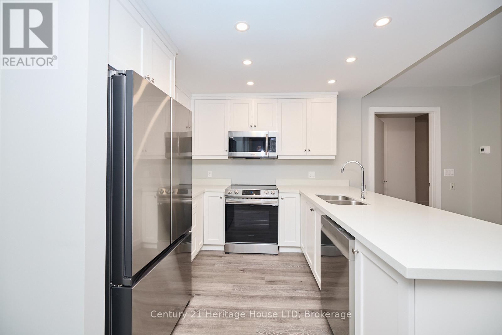407 - 300b Fourth Avenue, St. Catharines, Ontario  L2S 0E6 - Photo 5 - X12355276
