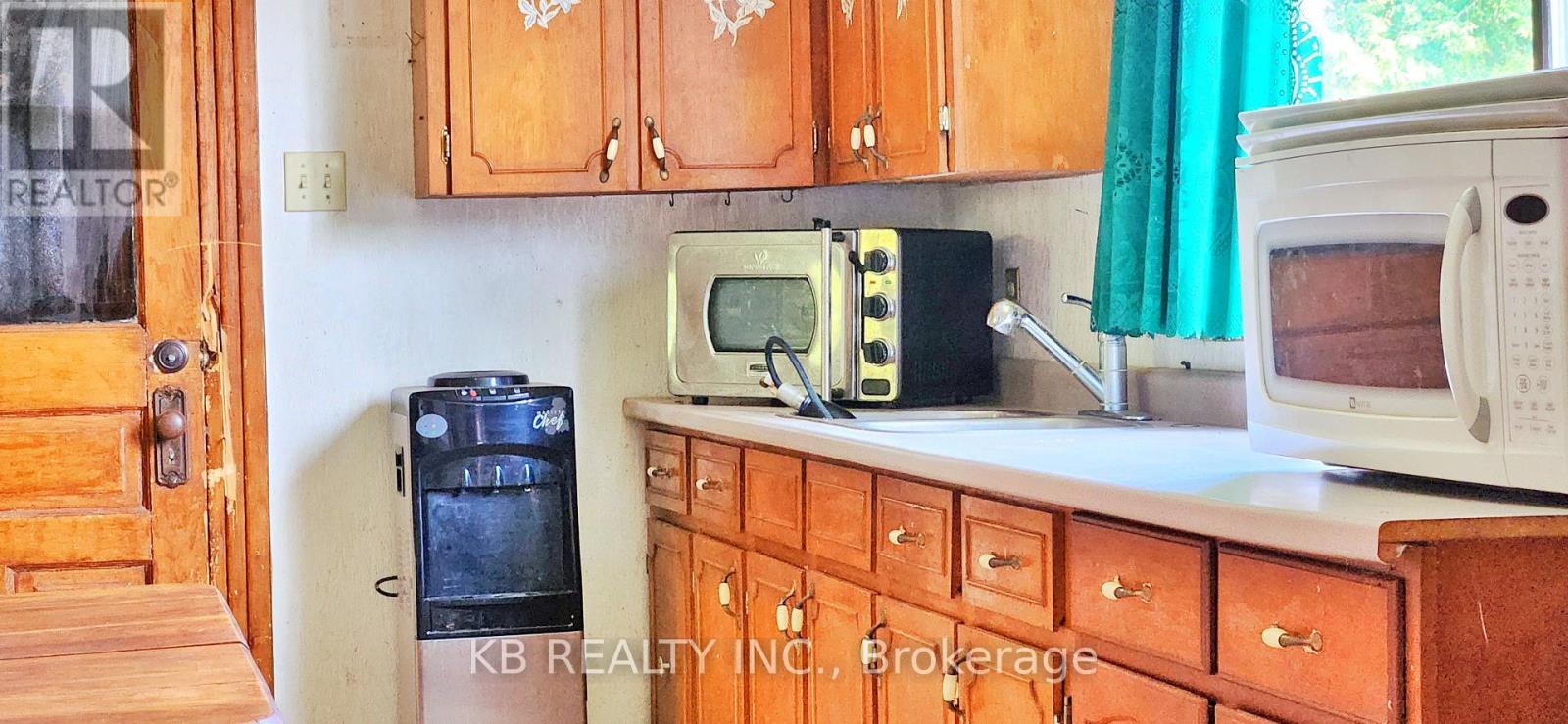 1033 Bridge Street, Central Frontenac, Ontario  K0K 1B0 - Photo 3 - X12355259