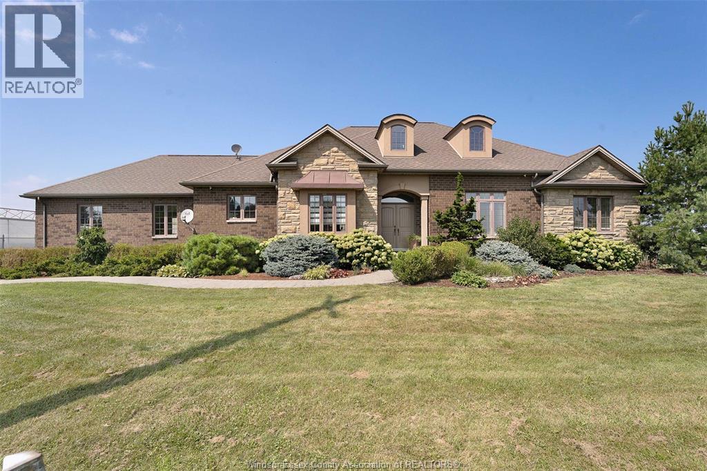 LIVE BEAUTIFULLY & EARN SUBSTANTIALLY! STUNNING HOME PAIRED WITH A HIGH PERFORMING ORGANIC GREENHOUSE! GREENHOUSE GROWS IN DEMAND ORGANIC VEGETABLES & HAS CURRENT PREMIUM CONTRACTS IN PLACE, 74,000+ sqft of greenhouse space in multiple zones incl offices, boardroom, lunchroom & more. Brand New PRIVA Climate Control & Irrigation (premium computerized system controlling water, climate and nutrients), sustainable water recycling & return tanks, backup power generator w/ new heating/cooling installations, & fully equipped w/ overhead irrigation booms for easy conversion to propagation. 600 VOLTS. AWSA, CSI ORGANIC & CANADAGAP CERTIFIED. 5000+sqft 5 bed, 5 bathroom home W/ gorgeous open concept layout throughout w/ separate entrance to basement for rental income/multigenerational living. Both w/ LRG kitchens & all new appliances. Living area & HUGE primary suite access to backyard oasis - Primary also incl 2 lrg walk-in closets and 5pc bath. Great financials available for serious buyers! (id:48254)