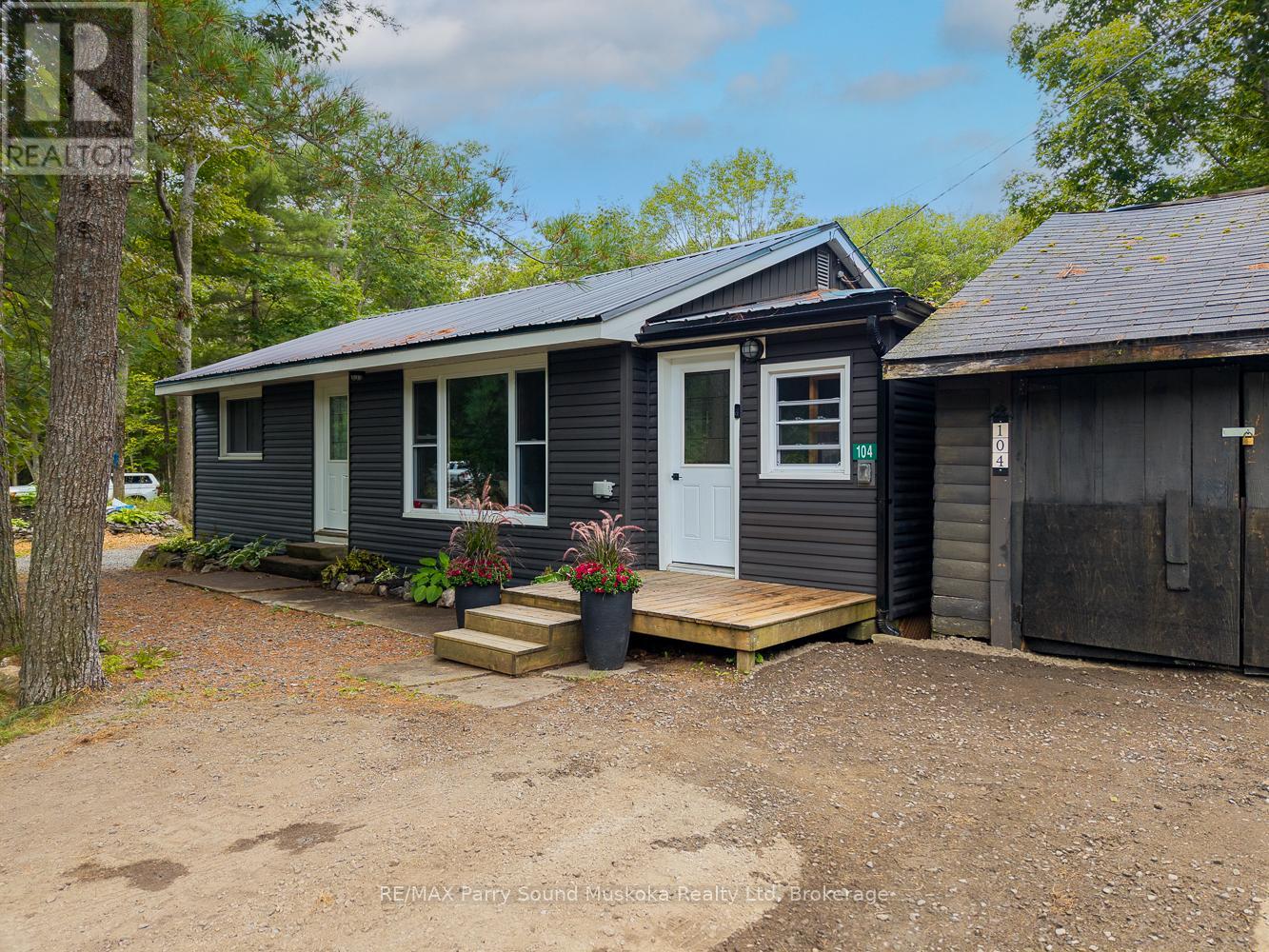 104 Parry Sound Drive, Mcdougall, Ontario  P2A 2W7 - Photo 1 - X12355831