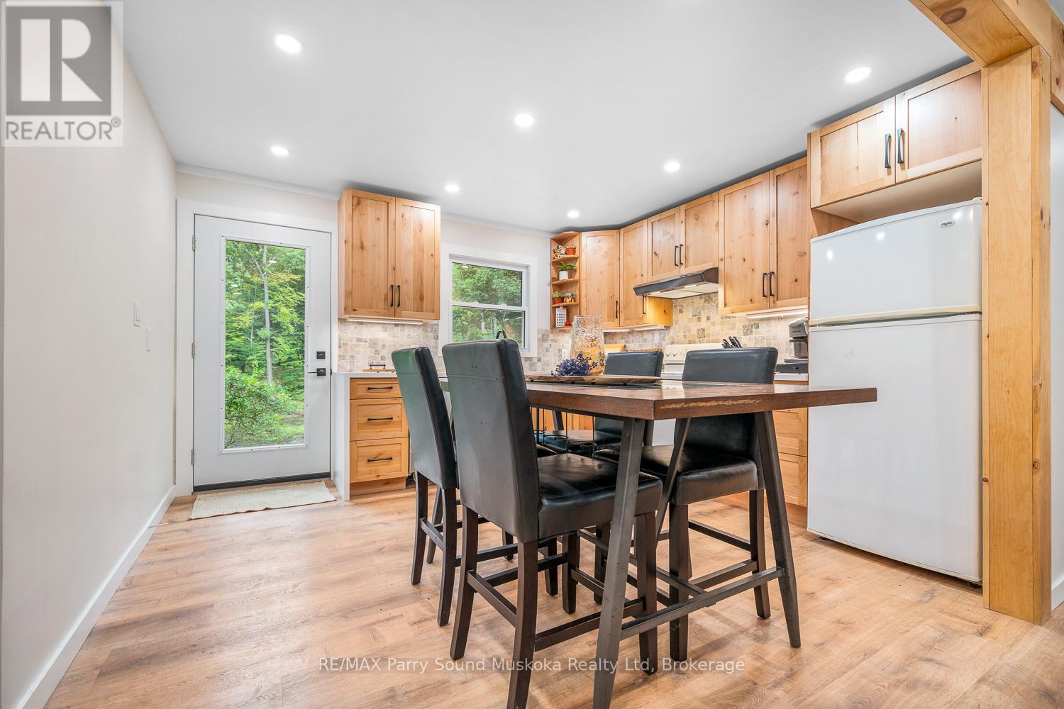 104 Parry Sound Drive, Mcdougall, Ontario  P2A 2W7 - Photo 7 - X12355831