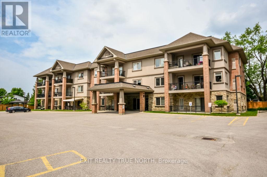 107 - 19b Yonge Street N, Springwater, Ontario  L0L 1P0 - Photo 1 - S12356690