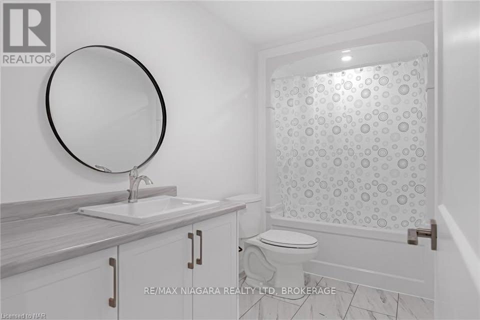 Lower - 7426 Parkside Road, Niagara Falls, Ontario  L2H 3V8 - Photo 11 - X12356818