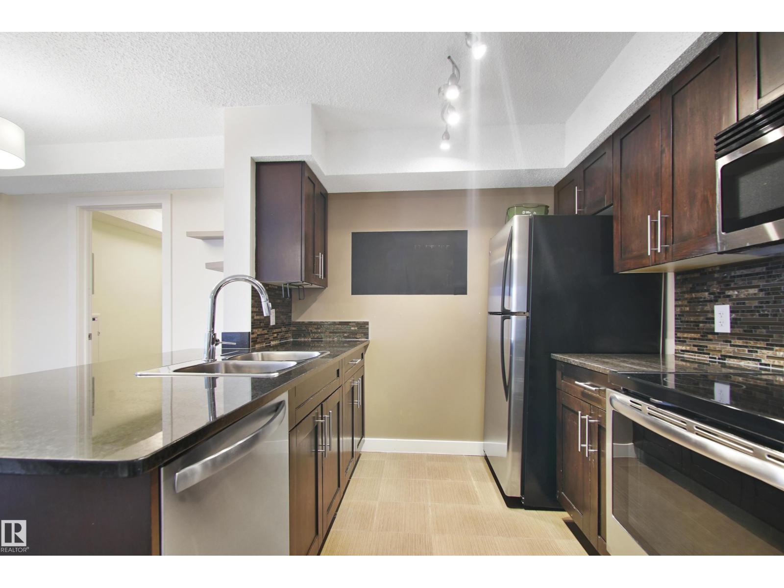 Property at #108 1080 MCCONACHIE BV NW image 5