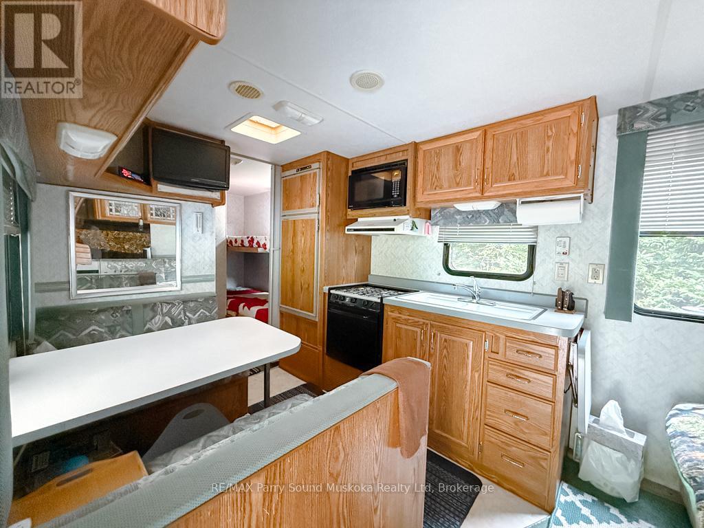 335 Centre Road, Mckellar, Ontario  P2A 0B4 - Photo 3 - X12357294