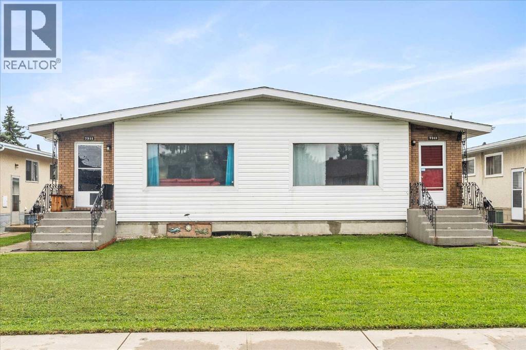 7311 / 7313 79 Avenue, Edmonton, Alberta  T6B 0C4 - Photo 1 - A2250286