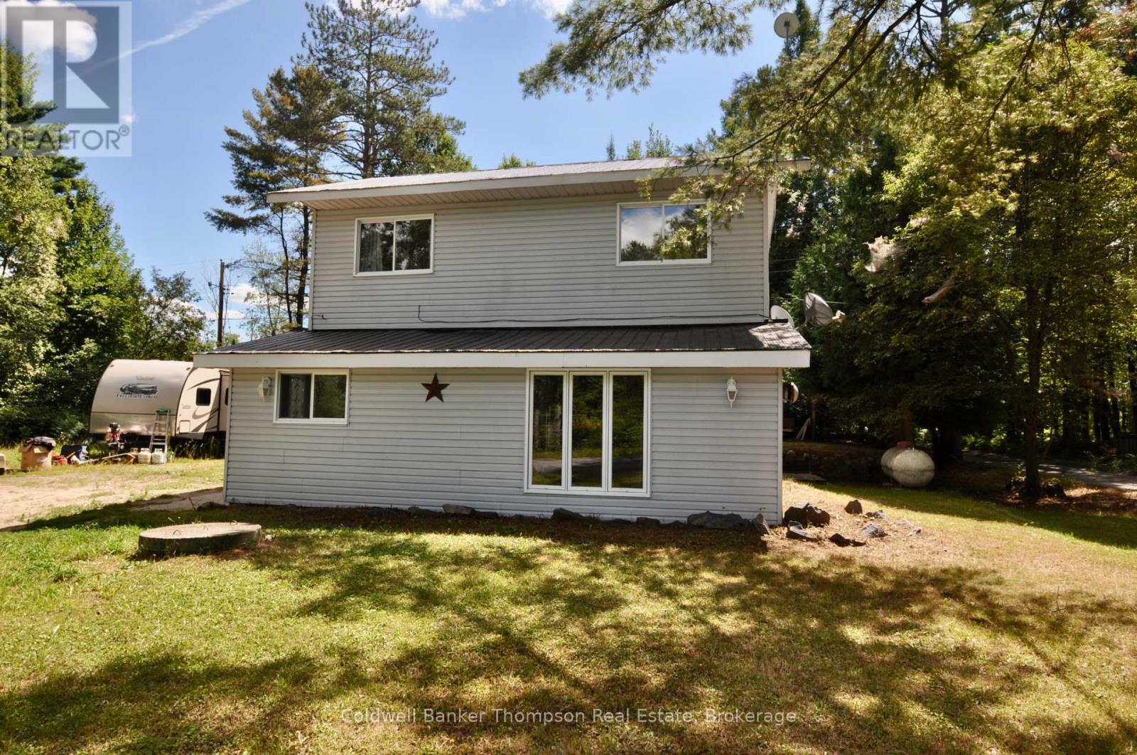 31 Hutcheson Beach Road, Huntsville, Ontario  P1H 1N4 - Photo 35 - X12358572